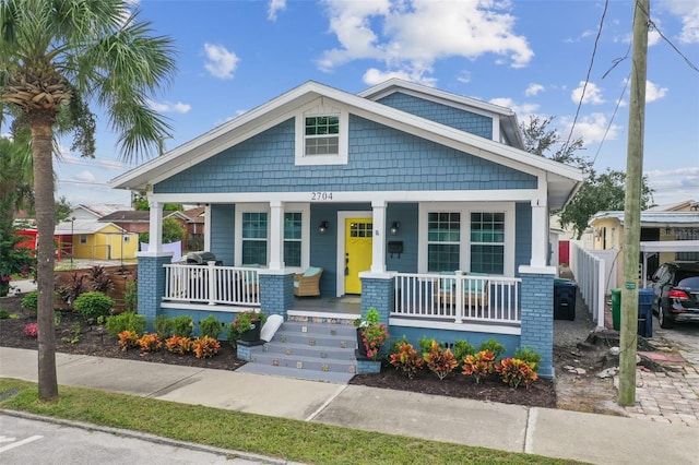 2704 W Main St, Tampa, FL 33607 - bungalow-style house with fence and a porch