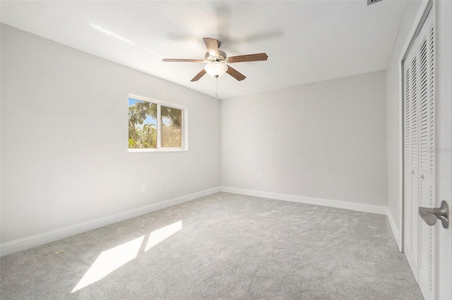 4120 Marine Pkwy, New Port Richey, FL 34652 - unfurnished bedroom featuring a closet, baseboards, and carpet