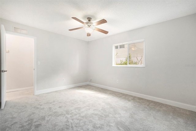 4120 Marine Pkwy, New Port Richey, FL 34652 - spare room featuring ceiling fan, baseboards, visible vents, and carpet floors