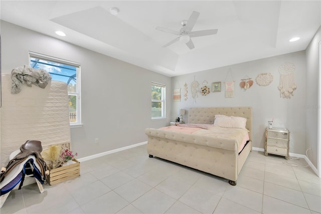 2511 Early Dawn Ct, Valrico, FL 33594 - bedroom featuring light tile patterned flooring, a raised ceiling, multiple windows, and recessed lighting