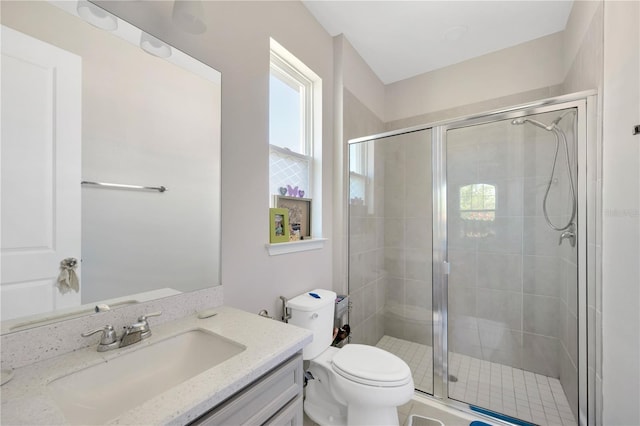 2511 Early Dawn Ct, Valrico, FL 33594 - bathroom featuring a shower stall, toilet, and vanity