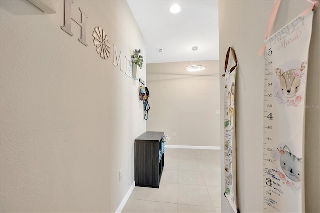 2511 Early Dawn Ct, Valrico, FL 33594 - corridor with baseboards and light tile patterned floors