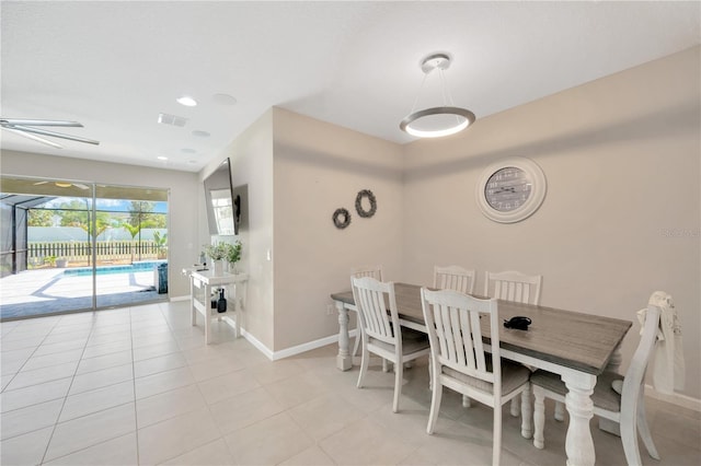2511 Early Dawn Ct, Valrico, FL 33594 - dining area featuring baseboards, a ceiling fan, visible vents, and light tile patterned flooring