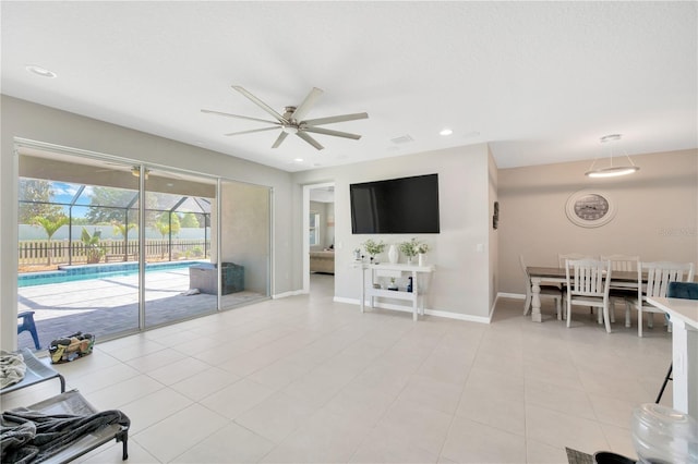 2511 Early Dawn Ct, Valrico, FL 33594 - living room featuring light tile patterned floors, baseboards, recessed lighting, and ceiling fan
