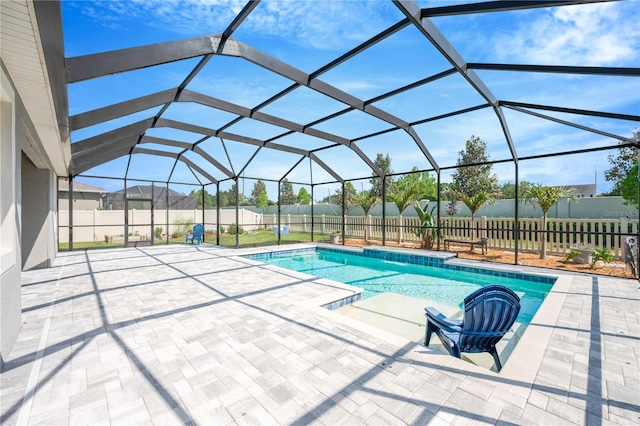 2511 Early Dawn Ct, Valrico, FL 33594 - view of pool with glass enclosure, a fenced in pool, a patio area, and a fenced backyard