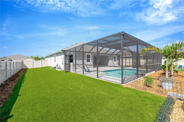 2511 Early Dawn Ct, Valrico, FL 33594 - rear view of house featuring a fenced in pool, a fenced backyard, a patio area, a yard, and stucco siding