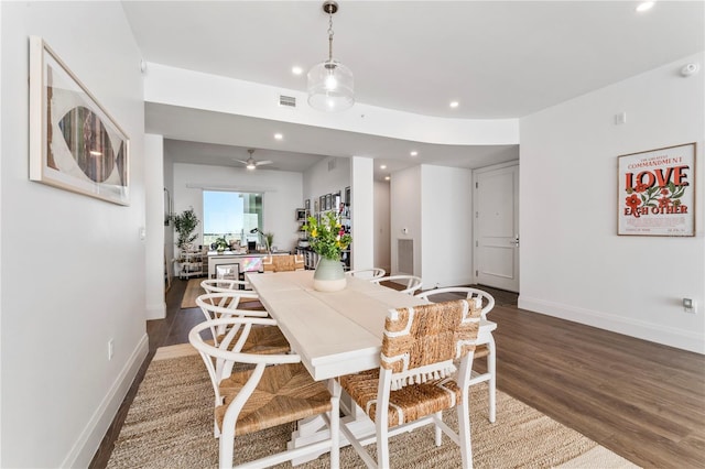 dining space with baseboards, recessed lighting, a ceiling fan, visible vents, and wood finished floors