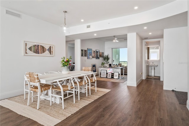 dining room featuring visible vents, recessed lighting, and dark wood finished floors