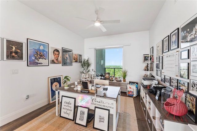 office area featuring ceiling fan, wood finished floors, and baseboards