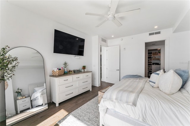 bedroom featuring a ceiling fan, visible vents, recessed lighting, and dark wood-style floors