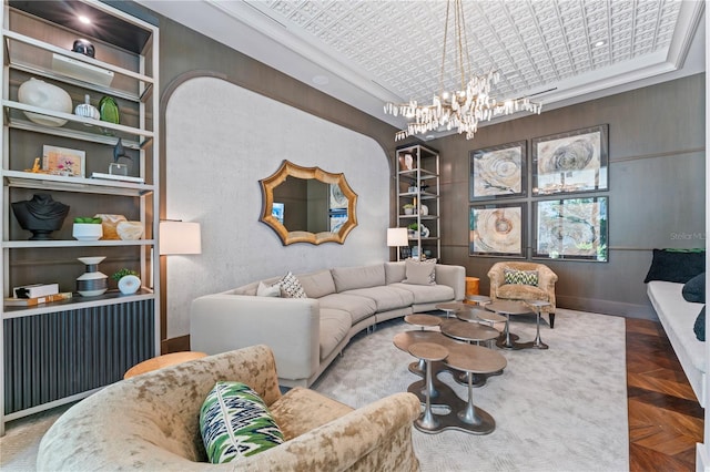 living room featuring a chandelier and built in features