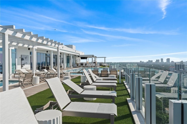 view of patio / terrace featuring a community pool and a pergola