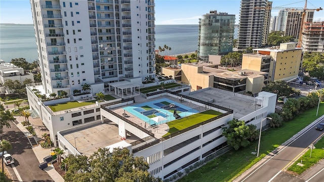 bird's eye view featuring a water view and a view of city