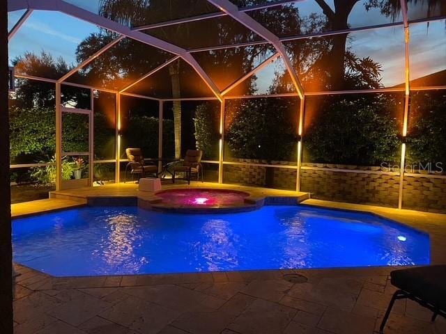 8933 Crescent Forest Blvd, New Port Richey, FL 34654 - outdoor pool featuring an in-ground hot tub, a patio area, and glass enclosure