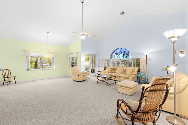 187 Sage Cir, Crystal Beach, FL 34681 - living area with carpet floors, high vaulted ceiling, a ceiling fan, and baseboards