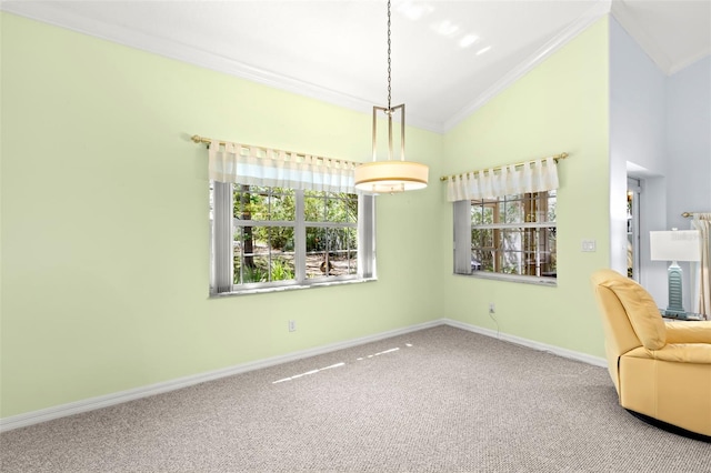 187 Sage Cir, Crystal Beach, FL 34681 - unfurnished room with crown molding, carpet floors, plenty of natural light, baseboards, and vaulted ceiling