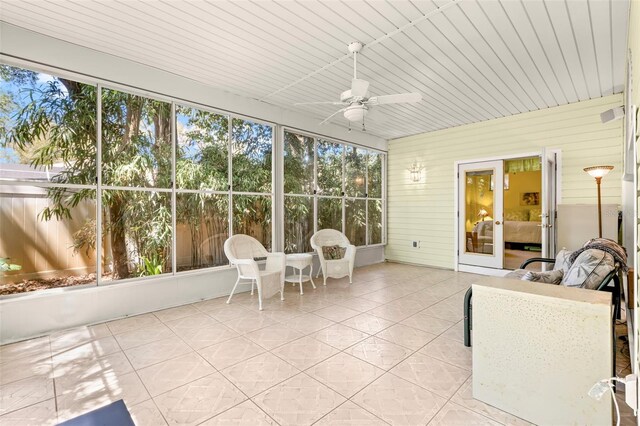 187 Sage Cir, Crystal Beach, FL 34681 - sunroom with ceiling fan and plenty of natural light