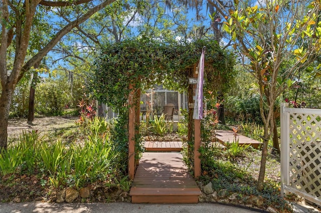 187 Sage Cir, Crystal Beach, FL 34681 - surrounding community with a wooden deck