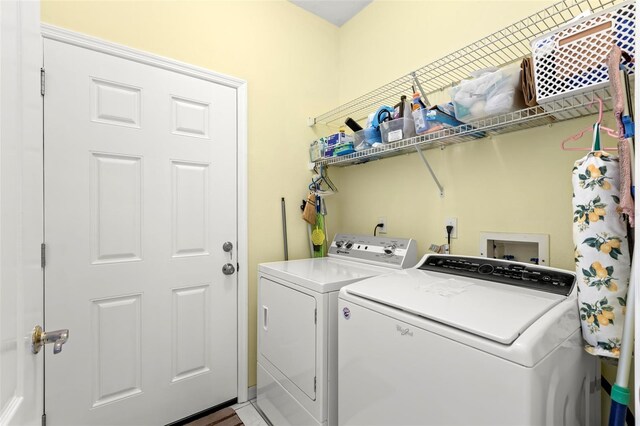 187 Sage Cir, Crystal Beach, FL 34681 - laundry area with washing machine and dryer