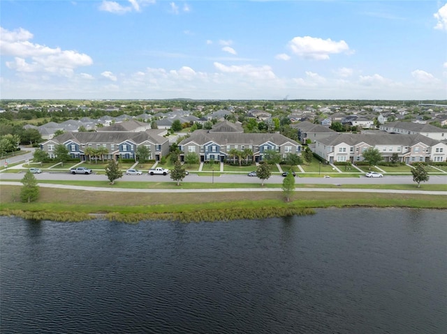 bird's eye view with a water view and a residential view