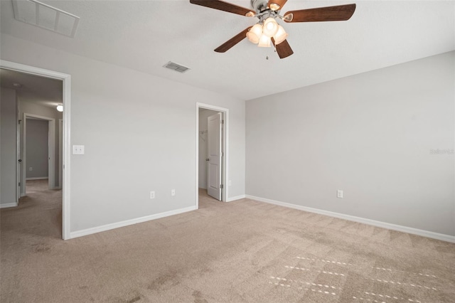interior space featuring visible vents, baseboards, and ceiling fan