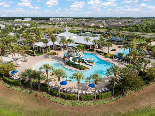 birds eye view of property with a residential view