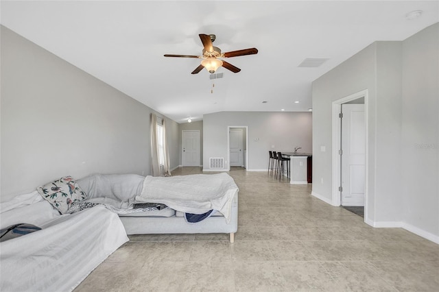 bedroom featuring visible vents, baseboards, a ceiling fan, and vaulted ceiling