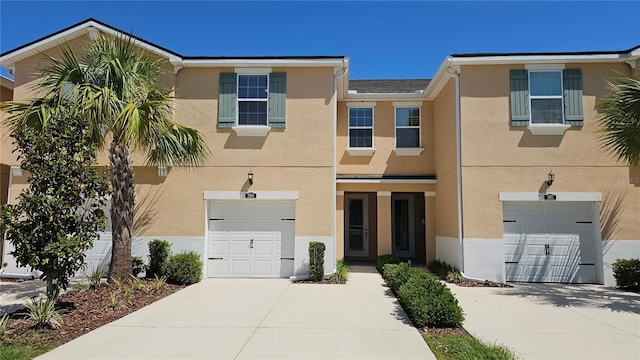 5509 Cumberland Star Ct, Lutz, FL 33558 - view of front of home featuring a garage, driveway, and stucco siding