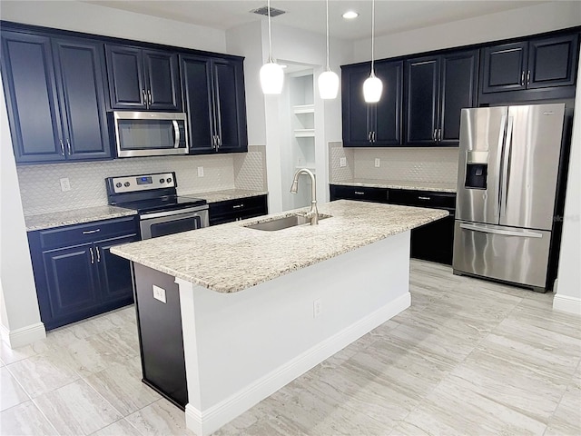 5509 Cumberland Star Ct, Lutz, FL 33558 - kitchen with stainless steel appliances, a sink, tasteful backsplash, a center island with sink, and baseboards