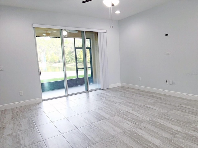 5509 Cumberland Star Ct, Lutz, FL 33558 - spare room with a ceiling fan, baseboards, recessed lighting, and light tile patterned floors