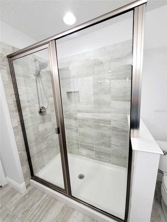 5509 Cumberland Star Ct, Lutz, FL 33558 - bathroom with a stall shower and toilet