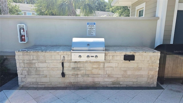 5509 Cumberland Star Ct, Lutz, FL 33558 - exterior view of a fire extinguisher