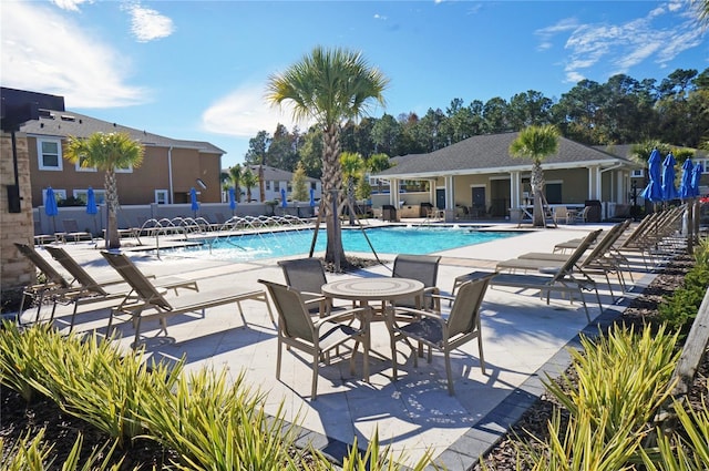 5509 Cumberland Star Ct, Lutz, FL 33558 - community pool featuring a patio and fence