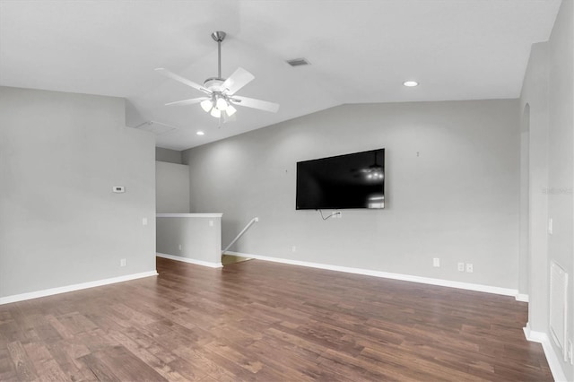 unfurnished living room featuring visible vents, baseboards, vaulted ceiling, wood finished floors, and a ceiling fan