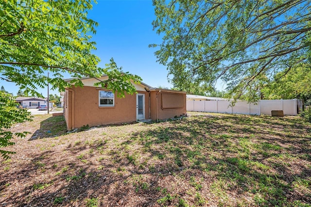 1051 Normandy Blvd, Holiday, FL 34691 - view of yard featuring fence