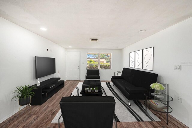 1051 Normandy Blvd, Holiday, FL 34691 - living area with baseboards, wood finished floors, visible vents, and recessed lighting