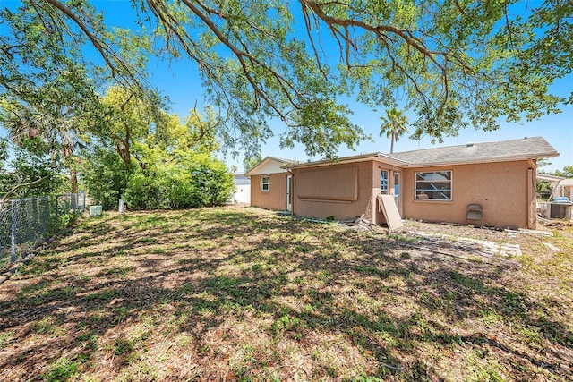 1051 Normandy Blvd, Holiday, FL 34691 - view of yard with fence and cooling unit