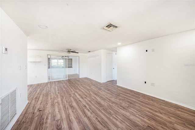 1051 Normandy Blvd, Holiday, FL 34691 - unfurnished room with ceiling fan, wood finished floors, and visible vents
