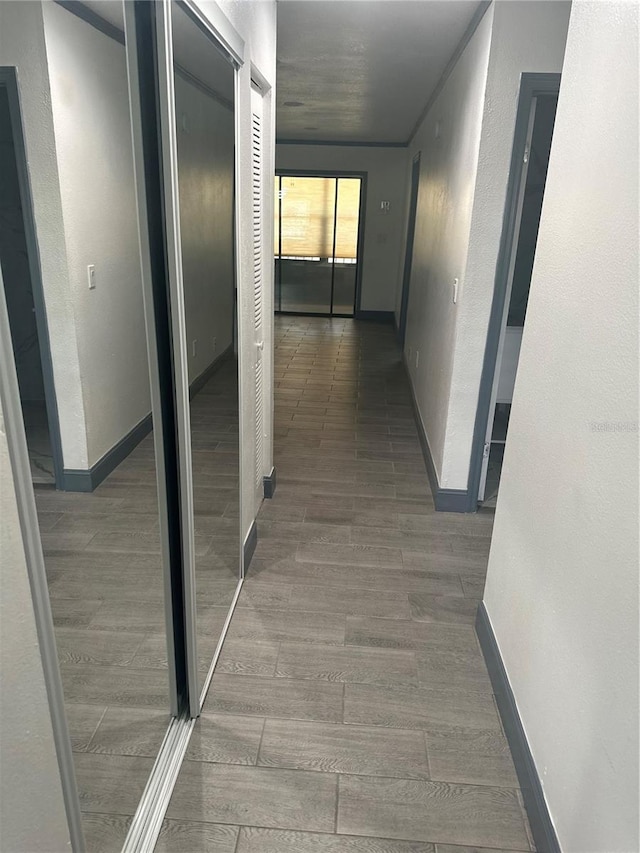 2275 62nd Ave N Unit 5202, Saint Petersburg, FL 33702 - hall featuring baseboards and wood finished floors