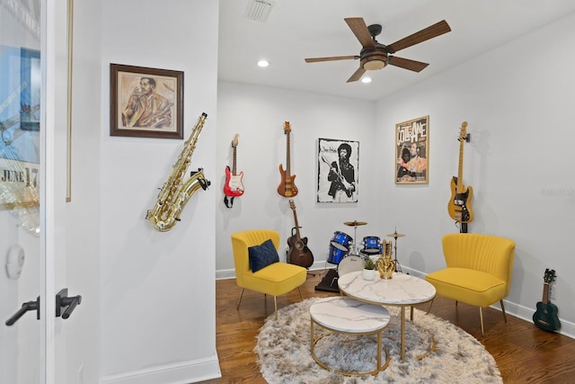 3325 W Wallcraft Ave, Tampa, FL 33611 - living area featuring recessed lighting, wood finished floors, visible vents, and baseboards