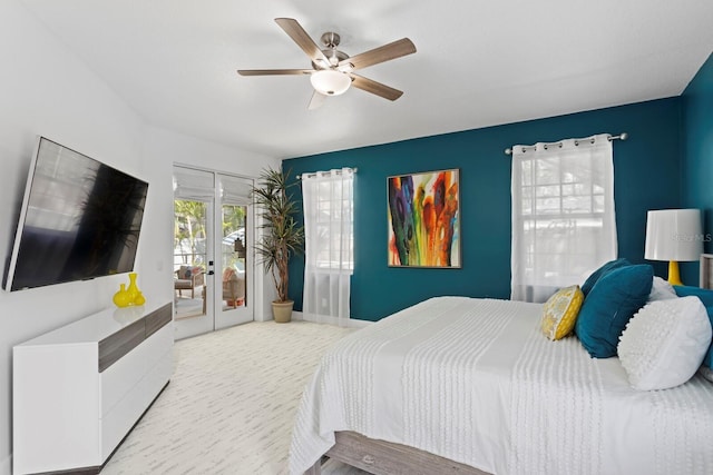 3325 W Wallcraft Ave, Tampa, FL 33611 - bedroom with access to exterior, baseboards, ceiling fan, and french doors