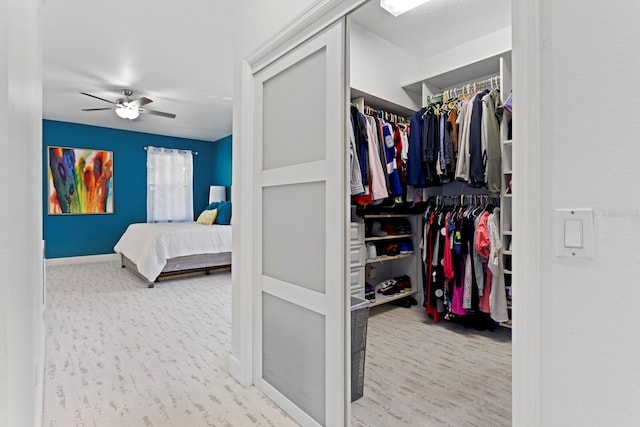 3325 W Wallcraft Ave, Tampa, FL 33611 - interior space with wood finished floors, a closet, a ceiling fan, and baseboards