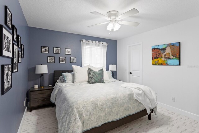 3325 W Wallcraft Ave, Tampa, FL 33611 - bedroom featuring baseboards and a ceiling fan