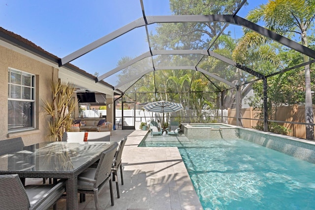 3325 W Wallcraft Ave, Tampa, FL 33611 - view of pool featuring outdoor dining space, a fenced backyard, a lanai, a patio area, and a pool with connected hot tub