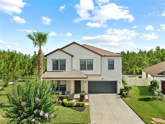 21383 Southern Charm Dr, Land O Lakes, FL 34637 - view of front facade with a garage, fence, a front lawn, a gate, and driveway
