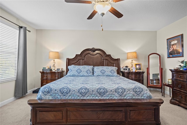 21383 Southern Charm Dr, Land O Lakes, FL 34637 - bedroom featuring baseboards, a ceiling fan, and light colored carpet