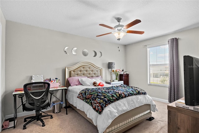 21383 Southern Charm Dr, Land O Lakes, FL 34637 - bedroom with a textured ceiling, baseboards, a ceiling fan, and carpet floors