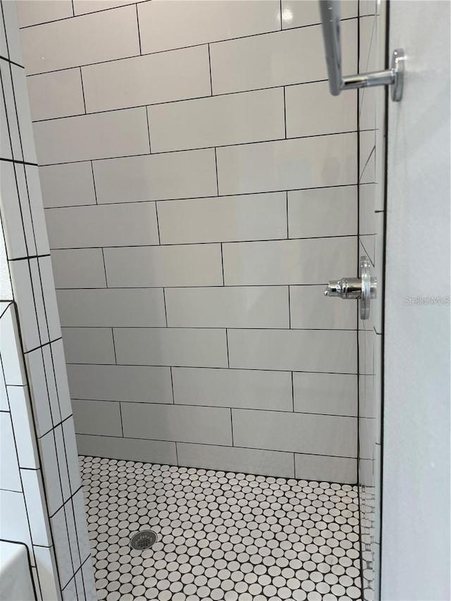 bathroom featuring a stall shower