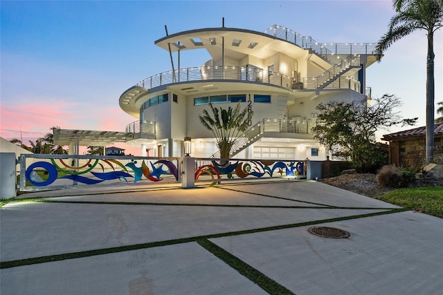 12650 7th St E, Treasure Island, FL 33706 - surrounding community with driveway and a garage