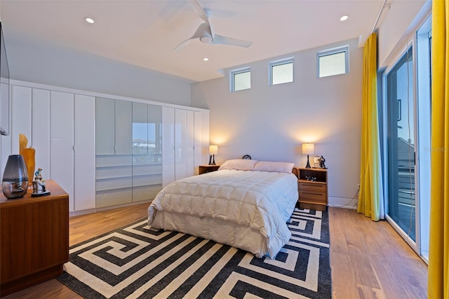 12650 7th St E, Treasure Island, FL 33706 - bedroom with wood finished floors, a ceiling fan, and recessed lighting